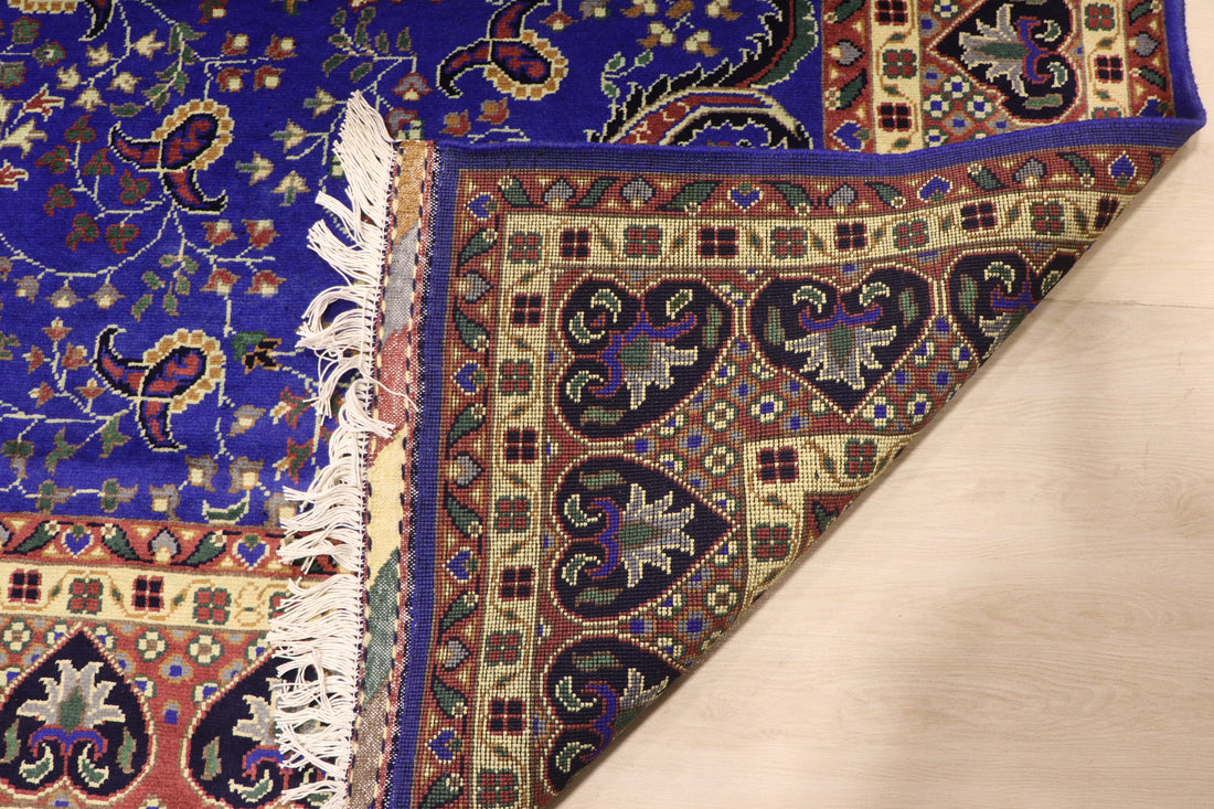 Front, reverse and fringes of an authentic hand-knotted Afghan carpet