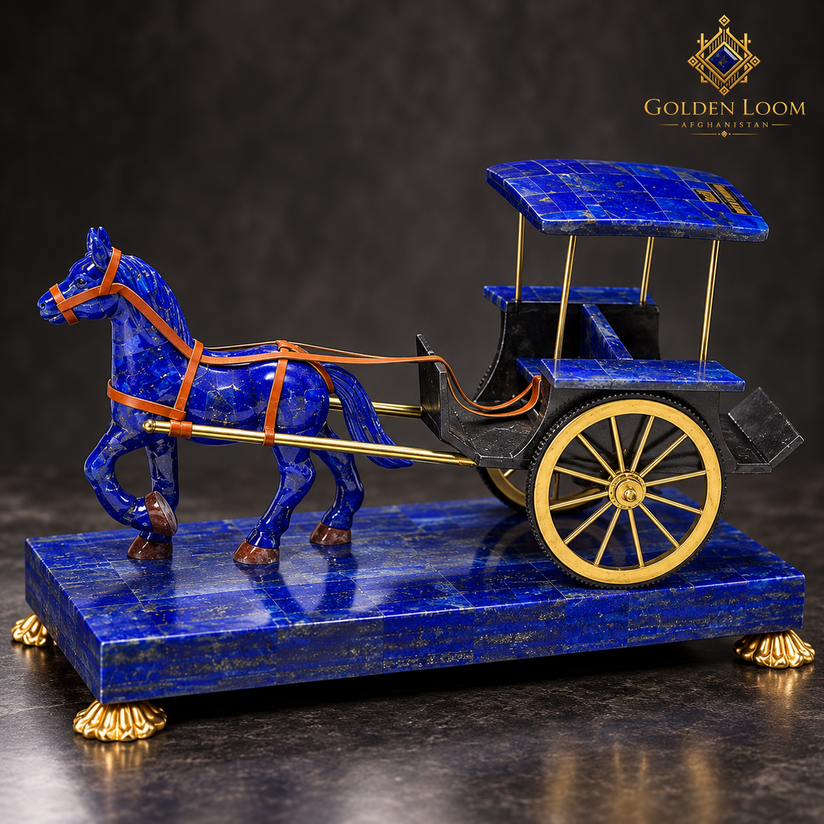 Handcrafted lapis lazuli horse-and-carriage sculpture with brass wheels and Golden Loom Afghanistan logo.