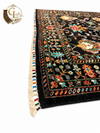 Corner detail of the Chobi Sultani carpet – revealing the extraordinary density of hand-tied knots, layered teal and crimson border guards, and the ivory fringe woven strand by strand in Jawzjan, Afghanistan