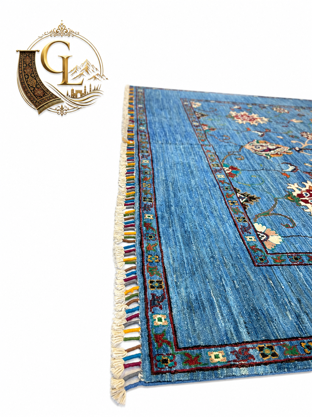 Corner close-up of Chobi Sultani Afghan carpet showing intricate Sultani floral motifs, scrolling vines, and multi-colored hand-tied fringe on a sky blue natural wool field — Golden Loom Afghanistan, Jawzjan