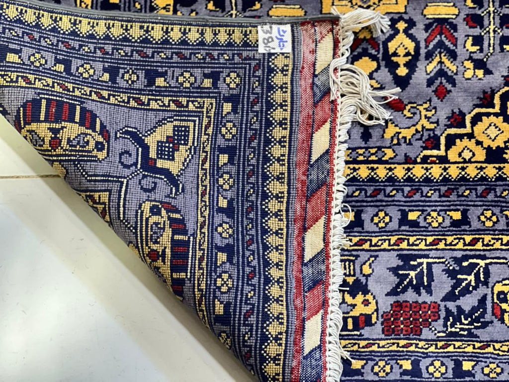 Close-up of hand-knotted back of Belzhiki ZerKhaki Afghan carpet showing dense 40x40 knot construction and natural wool quality – Golden Loom Afghanistan