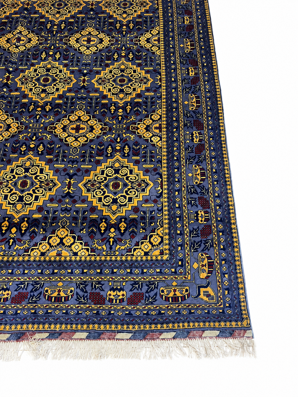 Belzhiki ZerKhaki Antique Afghan Carpet – close-up corner view showing hand-knotted blue and gold geometric pattern with natural wool fringe, by Golden Loom Afghanistan
