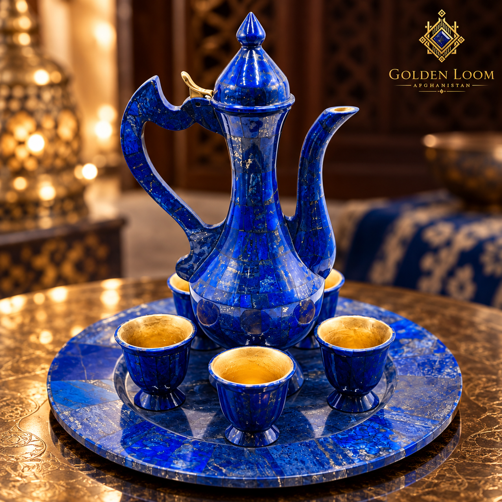 Close-up of the natural blue lapis lazuli texture and gold interiors of an Afghan serving set.