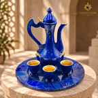Afghan lapis lazuli serving set arranged on a refined cream table setting.