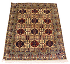 Hand-knotted Afghan wheat pattern rug with ivory field, navy and burgundy geometric medallions, and multi-border fringe detail — authentic artisan carpet by Golden Loom Afghanistan