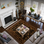 A styled interior room with a large ornate area rug in black, gold, and brown tones under a coffee table, surrounded by a sofa, armchair, fireplace, and dining table. A watermark reading 'GOLDEN HOME' appears near the top center.