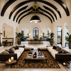 A luxury modern living room featuring a large beige sectional sofa with dark brown leather arms, arranged around a patterned oriental coffee table on a large ornate rug. The room has a grand arched ceiling with black beams, white walls, and potted plants.