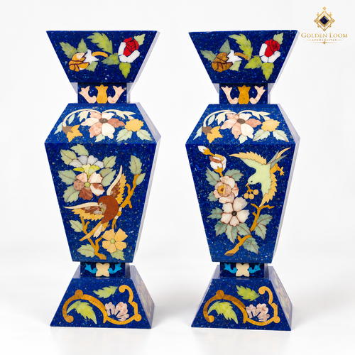 Four-sided Afghan stone vase pair featuring colorful bird and floral inlay on a white background.