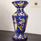 Detailed view of a six-sided mosaic vase highlighting birds, flowering branches, figurative stone inlay and textured lapis chips