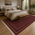Authentic Afghan hand-knotted wool rug with traditional red Bokhara geometric design styled in a neutral bedroom setting — Golden Loom Afghanistan