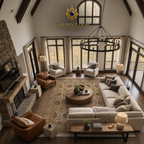 Aerial view of a handmade Afghan floral rug in a rustic mountain great room with vaulted ceilings, stone fireplace, leather armchairs, and forest views — Golden Loom Afghanistan
