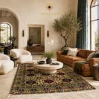 Traditional Afghan hand-knotted wheat pattern carpet with rich burgundy and ivory geometric medallions, placed in a bright Scandinavian-style living room with cream linen sofas — Golden Loom Afghanistan