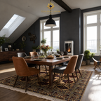 Afghan hand-knotted Bokhara carpet with ivory and burgundy geometric medallion pattern, styled in a dark Nordic dining room with leather chairs and exposed beam ceiling — Golden Loom Afghanistan