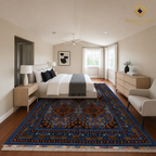 Traditional Afghan Mamluk carpet in royal blue and burgundy placed in a bright Scandinavian-style bedroom — Golden Loom Afghanistan