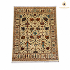 Afghan hand-knotted wool rug ivory background with rust teal and brown floral all-over pattern and knotted fringe