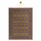 Overhead view of hand-knotted Afghan rug in grey and gold with all-over floral medallion design and decorative border
