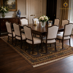 Hand-knotted Afghan area rug in charcoal and antique gold with all-over medallion pattern styled under a formal dark walnut dining table with eight upholstered chairs — Golden Loom Afghanistan