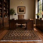 Hand-knotted Afghan wool rug in dark brown and ivory beneath a mahogany executive desk in a classic wood-paneled home library, Golden Loom Afghanistan