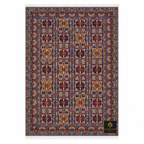 Handwoven Afghan area rug featuring intricate Turkmen-style medallion repeat pattern in burgundy, slate blue, and amber with ivory fringe — Golden Loom Afghanistan