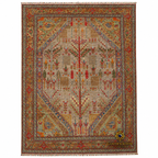 Handwoven Afghan tree-of-life carpet on white background, featuring intricate botanical motifs in red, gold, and sage on a warm beige field with tassel fringe