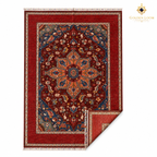 Full flat-lay of Chobi Kashan hand-knotted Afghan wool carpet with folded corner detail, showing red field, navy border, and ivory fringe on white background — Golden Loom Afghanistan
