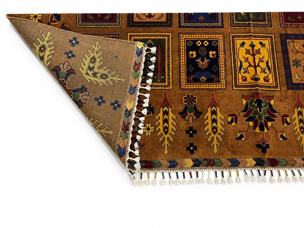 Folded corner of Belzhiki Afghan carpet showing reverse side and hand-finished fringe – dense Turkman wool weave, 40x40 knots per 10cm, handmade in Mazar-e-Sharif, Afghanistan by Golden Loom