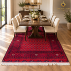 Red Afghan wool carpet beneath a walnut table in an elegant formal dining room