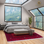 Red hand-knotted Afghan wool carpet in a luxury mountain-view bedroom
