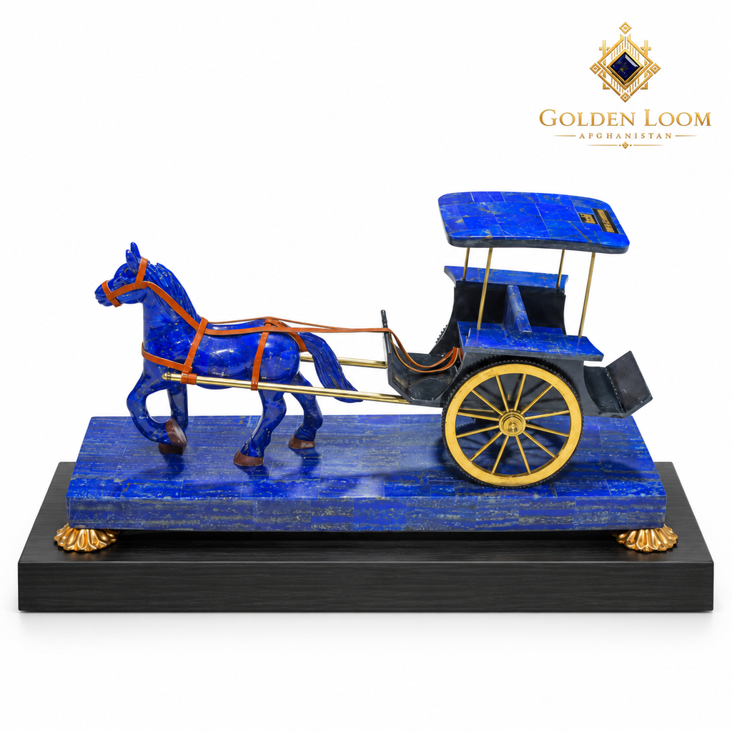 Handcrafted lapis lazuli horse-and-carriage sculpture with brass wheels displayed on a black wooden plinth against a white background.