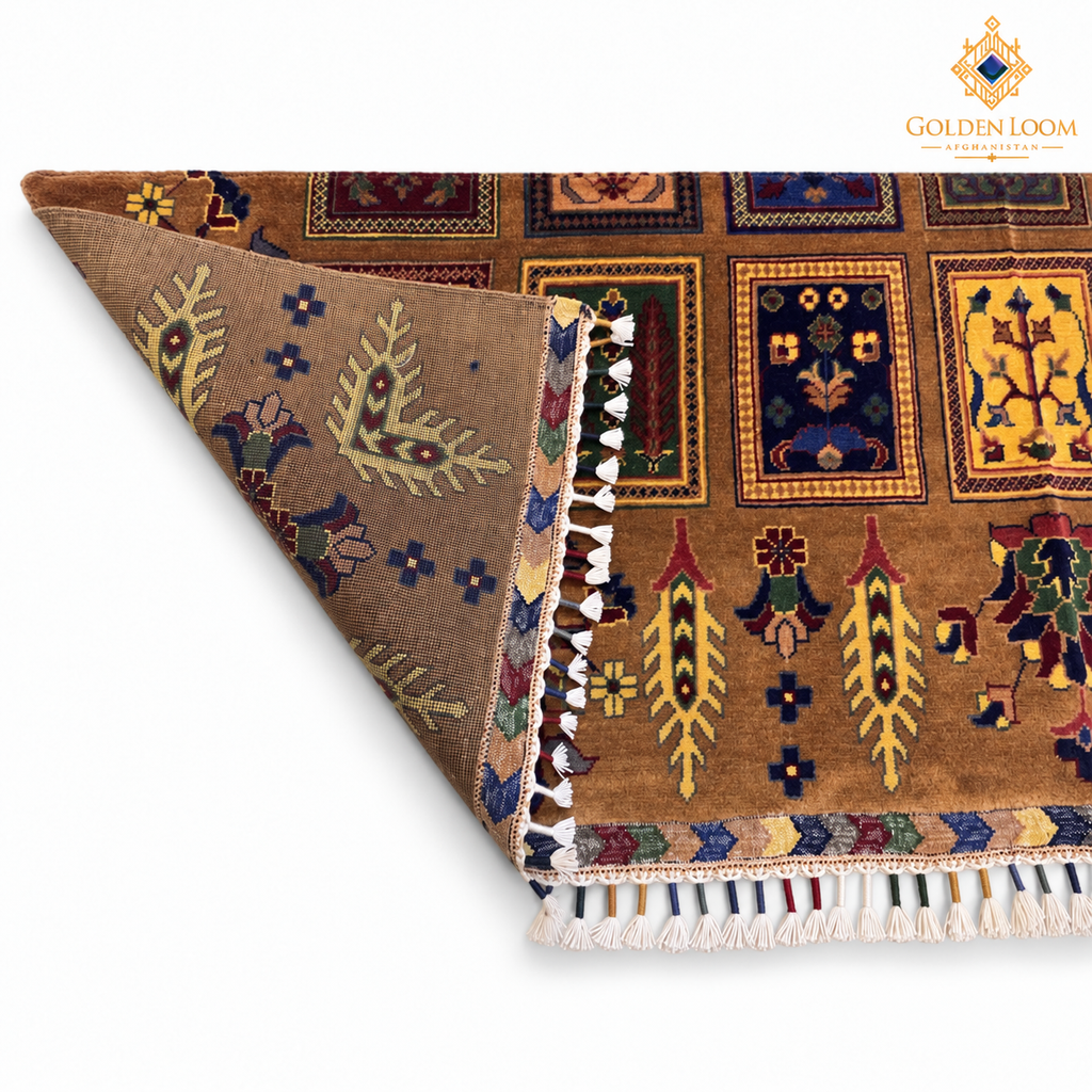 Close-up of the hand-knotted Afghan carpet showing its wool texture, detailed pattern and short-end fringe