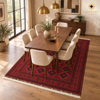 Red Khal Mohammadi Afghan wool carpet beneath a walnut dining table in a warm, elegant dining room.