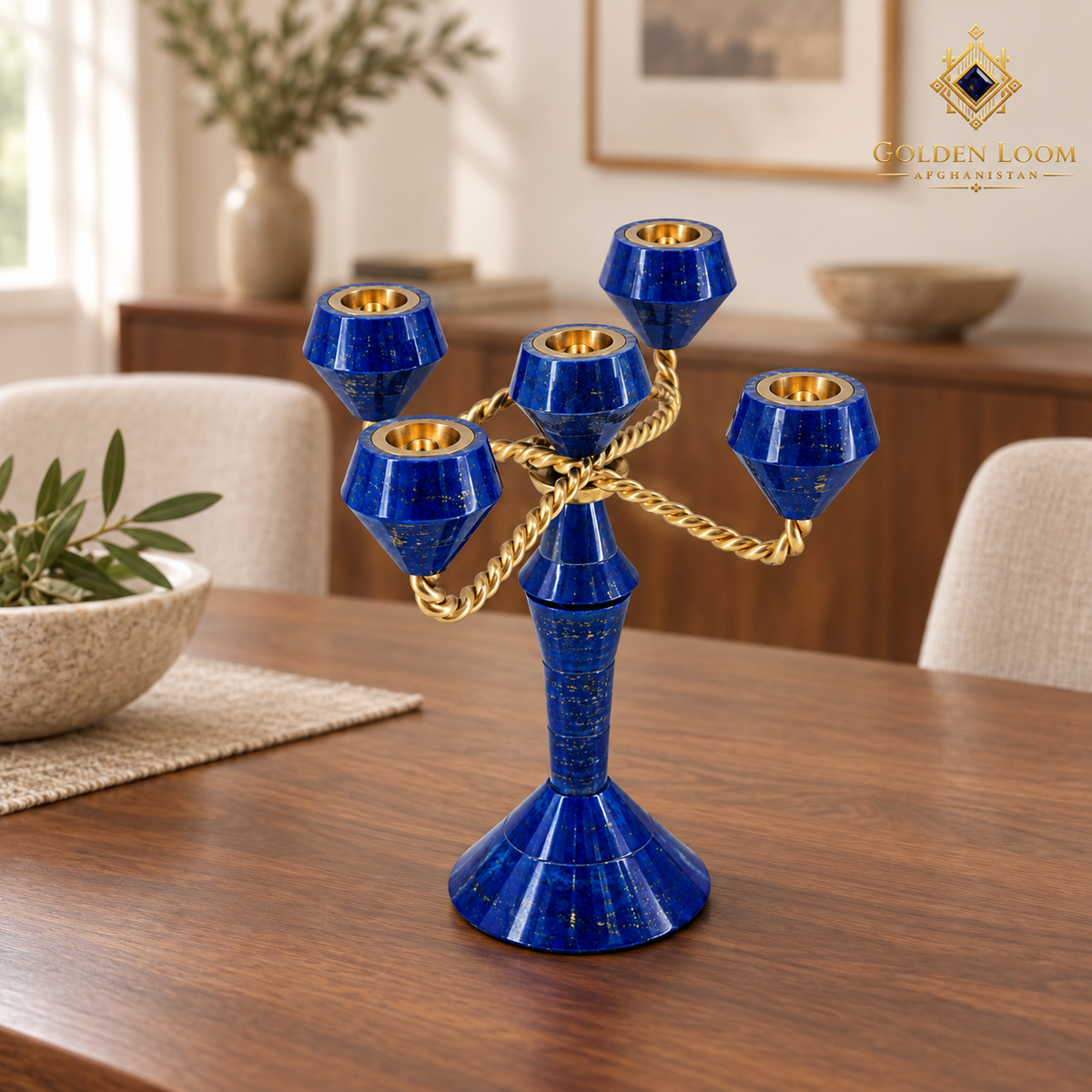 Handcrafted five-light lapis lazuli and brass candelabrum displayed on a walnut dining table in a refined interior.