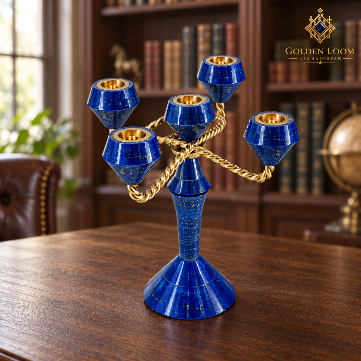 Handcrafted lapis lazuli and brass five-light candelabrum displayed on a walnut desk in a refined executive office.