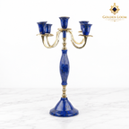 Individual five-arm candelabrum handcrafted from blue lapis lazuli and polished brass.