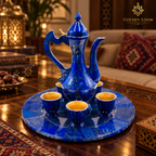 Blue Afghan lapis lazuli tea serving set displayed on a luxury wooden table.
