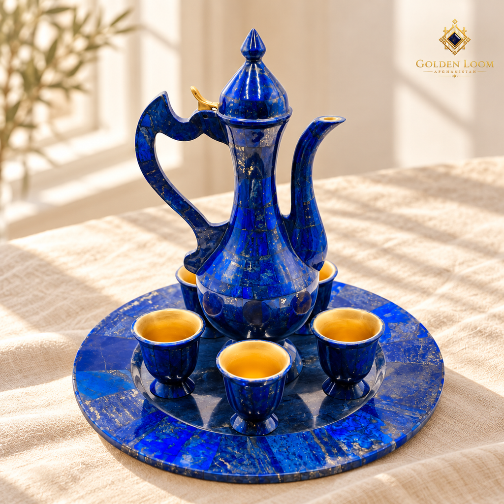 Luxury blue lapis lazuli serving set photographed against a dark background.