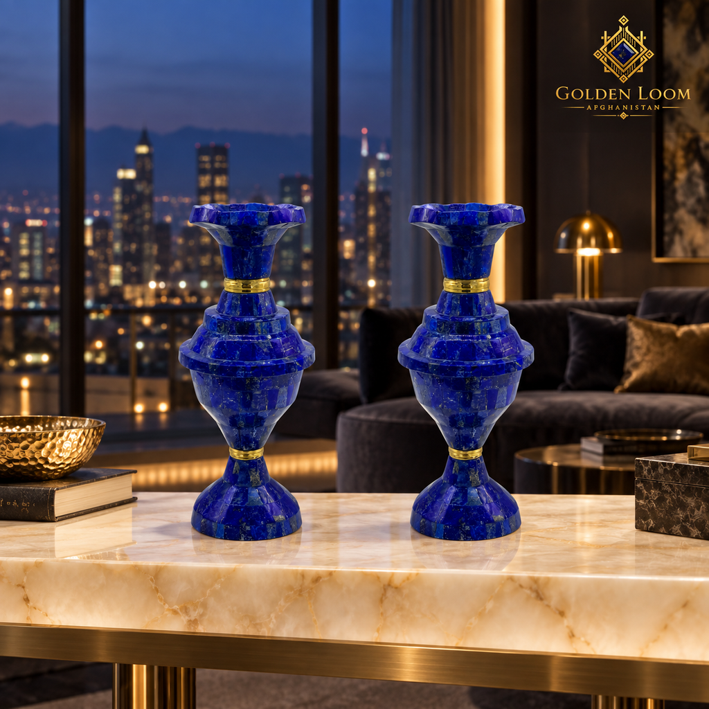 Imperial lapis lazuli vase pair with brass accents displayed in a luxury penthouse at night.