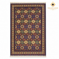 Top view of a multi-colour hand-knotted Afghan wool carpet with diamond motifs and fringed ends on a white background.