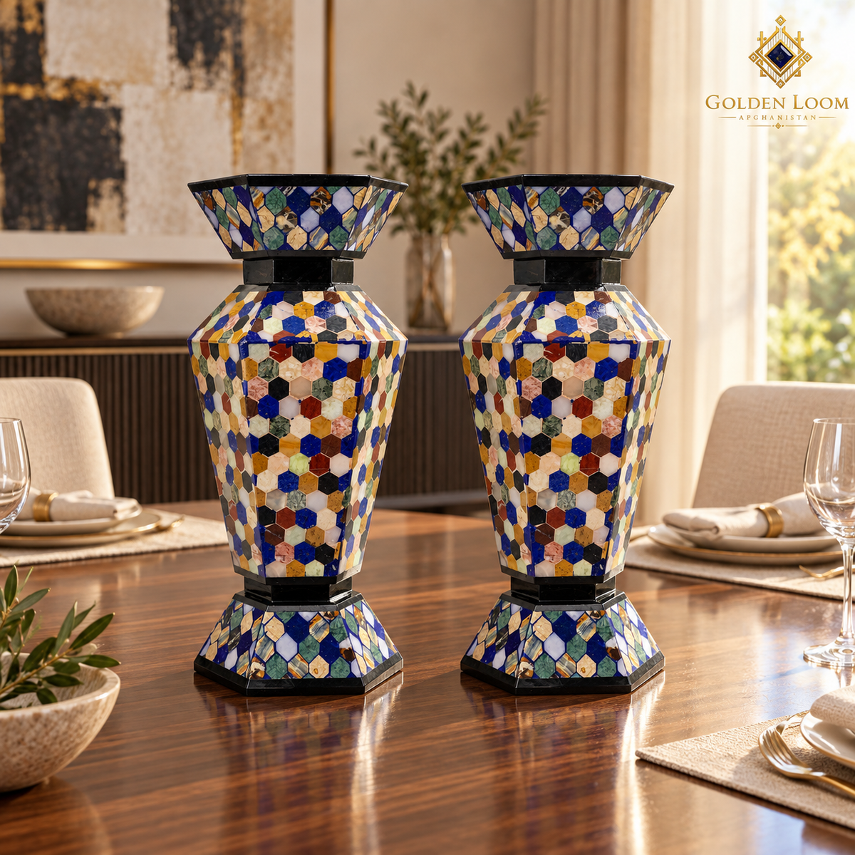 Hand-inlaid Afghan stone vase pair styled on a polished walnut dining table.