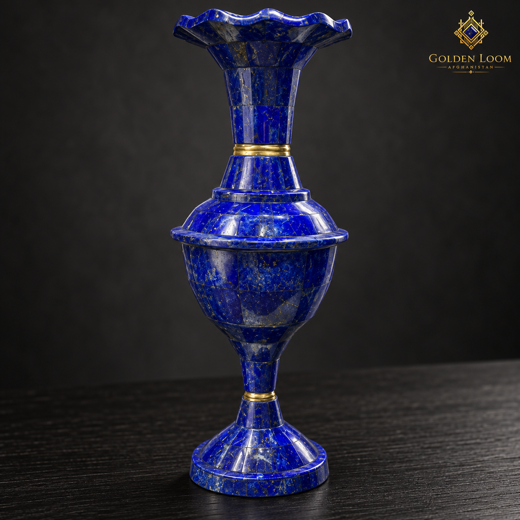 Close-up of a handcrafted lapis lazuli vase with brass collars and a scalloped rim.