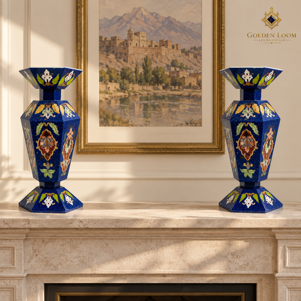 Matching pair of handcrafted Afghan mosaic vases displayed on a pale limestone mantel in a refined interior