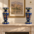 Matching pair of handcrafted Afghan mosaic vases displayed on a pale limestone mantel in a refined interior