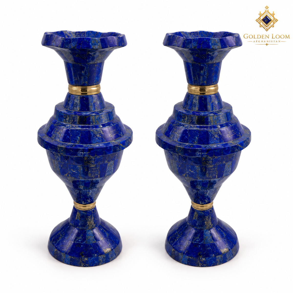 Matching pair of blue lapis lazuli vases with brass accents on a clean white background.