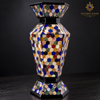 Close-up of geometric honeycomb stone inlay on a handcrafted six-sided Afghan vase.