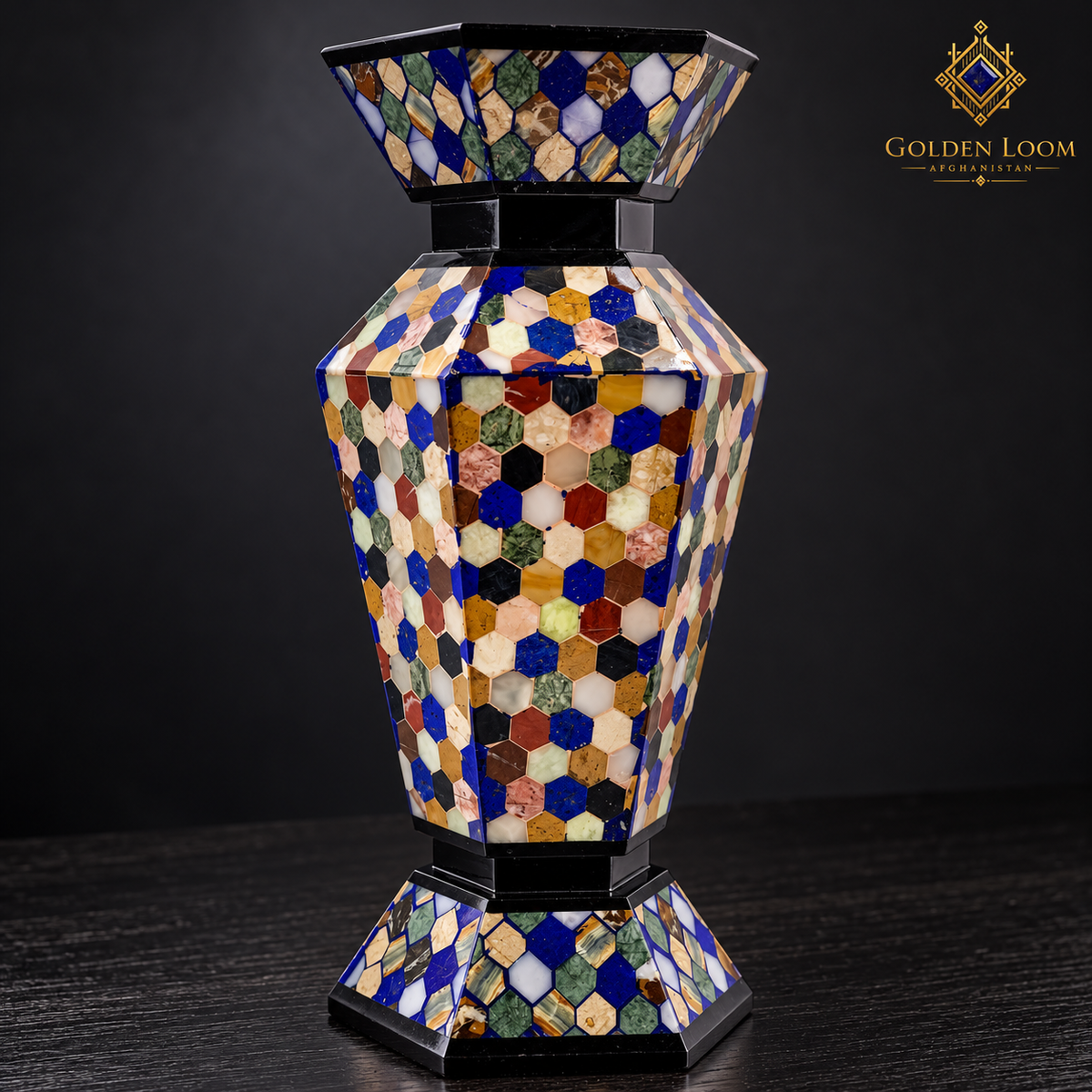 Close-up of geometric honeycomb stone inlay on a handcrafted six-sided Afghan vase.