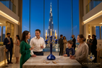 Golden Loom Afghanistan lapis lazuli candelabra at an upscale evening gathering with Burj Khalifa view — handcrafted Afghan gemstone candle holder for luxury interiors