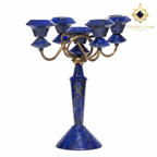Handcrafted Afghan lapis lazuli five-arm candelabra with interlocking brass frame, angled view on white background — Golden Loom Afghanistan decorative gemstone candle holder