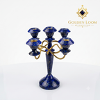 Handcrafted Afghan lapis lazuli five-arm candelabra with interlocking brass frame, angled view on white background — Golden Loom Afghanistan decorative gemstone candle holder