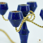 Close-up of genuine lapis lazuli candle cup holders with gold rope detailing, handcrafted Afghan gemstone candelabrum, Golden Loom Afghanistan