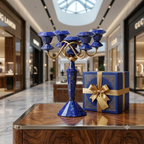 Golden Loom Afghanistan lapis lazuli candelabra displayed with branded navy and gold gift box in a luxury retail setting — handmade Afghan gemstone candle holder